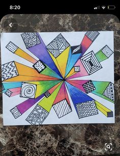 a drawing on paper with different colors and shapes