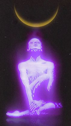 an image of a person sitting in the dark