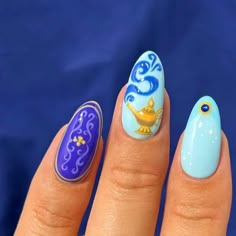 the nailologist🍒🌸🦋🌈✨ on Instagram: "Disney princess nails: Aladdin edition 🩵🧞‍♂️👑 Rings are from @monicavinader and you can use code NAILOLOGIST20 for 20% off💙 #nails #nailinspo #nailart #princessnails #disneynails #halloweennails" Aladdin Nails Acrylic, Disney Jasmine Nails, Jasmine Nail Art, Disney Princess Nails Aesthetic, Elemental Nails Disney, Aladdin Nail Art, Jasmine Nails Disney, Disney Inspired Nails Princesses, Disney Princess Themed Nails