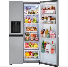 an open refrigerator filled with lots of food and drinks on the inside, including juice