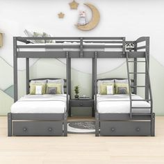 two bunk beds in a room with white walls and wood flooring, along with a clock on the wall