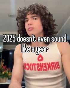 a man in a tank top with the words 205 doesn't even sound like a year