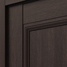 an image of a dark wood cabinet door