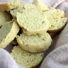 a pile of cookies sitting on top of a pink blanket