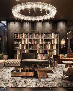 a living room filled with furniture and a chandelier