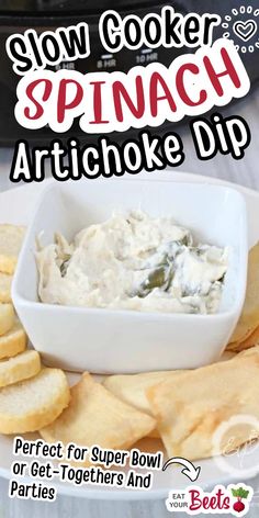 the cover of slow cooker spinach artichoke dip is shown with crackers