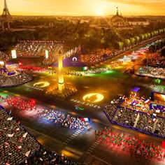 an aerial view of a city at night with lights on and people in the street