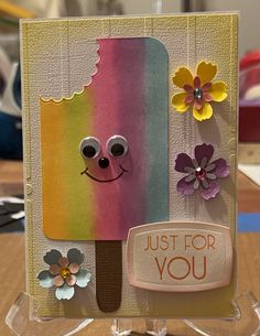 a card with an ice cream cone and flowers on it that says just for you