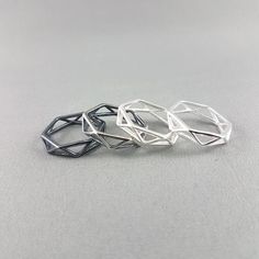 This elegant, geometric, sterling silver origami inspired ring is the perfect First Anniversary gift, the Paper Anniversary.Each 925 sterling silver geometric origami ring is a standard US size 6.  (Only comes it one size at the moment)Available in 4 finishes: Polished Silver, Matte Satin, Antique and Oxidized Black.Geometric silver ring comes wrapped in a petit gift box and is ready to send to whomever you wish.  We would be more than happy to include a little note from the heart if you choose Ring Origami, Origami Ring, First Anniversary Paper, Geometric Origami, Origami Jewelry, First Anniversary Gifts, Paper Anniversary, Geometric Ring, Casting Jewelry