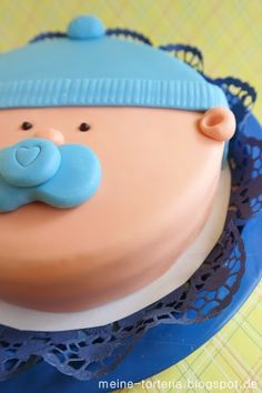 there is a cake that looks like a baby's head