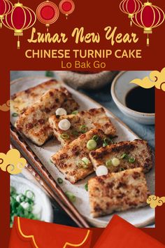 an advertisement for chinese turnip cake with chopsticks and sauce on the side