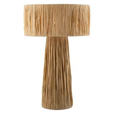 a table lamp made out of straw on a white background