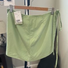 Nwt Light Green Size 8 Mini Skirt Summer Mini Length Relaxed Wrap Skirt, Summer Cotton Mini Wrap Skirt, Green Cotton Summer Skirt, Summer Solid Color Lined Wrap Skirt, High Waist Solid Wrap Skirt For Spring, Solid High Waist Wrap Skirt For Spring, Lined Summer Wrap Skirt, Spring Mini Length Wrap Skirt, Trendy Mini Wrap Skirt For Spring