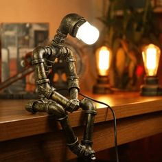 Iron Robot Lamp - Breck and Fox Steampunk Desk, Steampunk Table, Robot Lamp, Pipe Desk, Vintage Loft, Vintage Robots, Industrial Desk Lamp, Industrial Style Lighting, Pipe Lamp