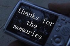 a person holding up a cell phone with the words thanks for the memories on it