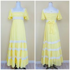 Adorable Lorrie Deb cotton voile prairie dress. Sunny yellow shade. Empire waist with semi sheer flutter sleeves. Tiered skirt with lace trim. Acetate lined. Back zipper closure.  Condition: Great! Repair on the inside liner, can't be seen when worn. Shown in photos. Exterior is perfect.  Measurements: Tag Size 14 Bust: 34-36" Waist: 28" (Empire waist) Hips: 38" Length: 56" ---------- Policies: I do not accept ANY returns currently. Please read the description in detail and ask any and all quest Summer Prairie Dress With Empire Waist And Ruffles, Short Sleeve Prairie Dress With Lace Trim For Spring, Spring Prairie Dress With Lace Trim And Short Sleeves, Summer Prairie Dress With Lace Trim And Square Neck, Vintage Lace Prairie Dress For Summer, Spring Short Sleeve Prairie Dress With Lace Trim, Yellow A-line Vintage Dress For Summer, Vintage Prairie Dress With Lace Trim For Summer, Vintage Tiered Lace Trim Dresses