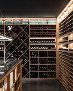 the wine cellar is full of many bottles