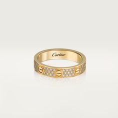 Cartier - LOVE wedding band - Ring Gold/Diamond - LOVE wedding band, yellow gold (750/1000), set with 88 brilliant-cut diamonds totaling 0.31 carats (for size 52). 4 mm to 5 mm width following metrics. Please note that the carat weight, number of stones and product dimensions will vary based on the size of the creation you order. For detailed information please contact us. Wedding Ring With Cartier Band, Cartier Band, Cartier Diamond Rings, Cartier Wedding Bands, Cartier Wedding Rings, Cartier Love Wedding Band, Wedding Band Yellow Gold, Ring Gold Diamond, Cartier Love Ring