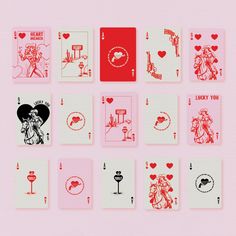 playing cards with different designs on them and the words i love you written in red