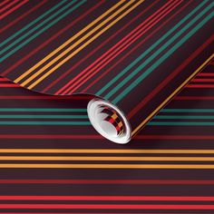 a colorful striped wallpaper with an abstract design