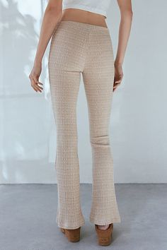 BDG flare pant in a textured knit for a look that’s both comfy & stylish. Features a mid-rise, easy pull-on waistband and flared leg for an elevated finish. Exclusively at Urban Outfitters. Features BDG Pria knit pull-on flare pant Pull-on trouser Soft & stretchy textured knit Mid-rise pull-on waistline Slim fit though waist and seat Flare silhouette Full length Easy pull-on style UO exclusive Content + Care 60% Polyester, 28% cotton, 10% nylon, 2% spandex Machine wash Imported Size + Fit Model Flare Pant, Textured Knit, Trending Dresses, Popular Style, Flare Pants, Bottoms Pants, Knit Dress, Womens Bottoms, Mid Rise