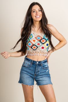 Crochet knit top from Lush Fashion Lounge women's boutique in Oklahoma City. Lush boutique in OKC has a variety of cute tops and more! This crochet top is perfect for Summer! Model is 5'7 size 24. 100% acrylic Knit Tops For Vacation In Fall, Trendy Crochet Lace Tops For Spring, Beige Stretch Top With Crochet Lace, Trendy Fitted Top With Crochet Lace, Trendy Fitted Tops With Crochet Lace, Casual Fitted Top With Crochet Trim, Summer Knit Crochet Crop Top, Knit Crop Top For Beach, Bohemian Knit Crochet Top For Day Out