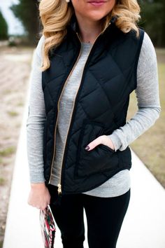 A quilted vest is both fashionable and functional. Opt for one in a neutral hue to layer over sweaters & knits. Mode Casual, Outwear Jackets, Black Vest, Outfit Idea, Outfits Casuales, Sweater Weather