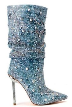 Demin & Diamonds Denim Boots is an ultra-glam bootie featuring a denim upper, iridescent rhinestone and spiked detailing, a slouchy mid-calf height Denim Stiletto Pointed Toe Rhinestone Detailed This beauty has a washed denim upper with a slouched design, pointed toe, iridescent rhinestones and spikes. WIDE CALF FRIENDLY True to size 12” shaft height 4.5” heels Slip on fit ****PLEASE ALLOW 5 DAYS FOR FULLFILLMENT*** *PRE-ORDER ITEM* Glamorous Boots With Rhinestone Rivets And Pointed Toe, Glamorous Bling Pointed Toe Boots, Sapphire Rhinestones Boots, Luxury High Heel Boots With Rhinestone Rivets, Blue Pointed Toe Boots With Rhinestones, Diamonds And Denim Party, Diamond Theme, Denim Party, Diamond Party