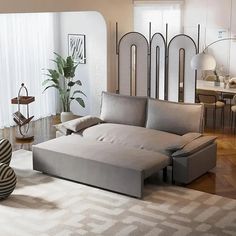 a living room filled with furniture and decor