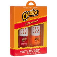 Dimensions: 2" x 1" Material: Glass & Plastic Color: Red, Orange & White Care & Safety: For External Use Only, Do Not Consume Quantity: 2 Nail Polishes & 1 Decal Sheet Show off your amazing style with the help of this Cheetos Flamin' Hot Nail Polish Set. This set includes a matte red and glittery orange nail polish to resemble Flamin' Hot Cheetos. There is also a decal sheet to embellish your nails with small flames for a fun, scorching finish. Spend an afternoon with a relaxing activity like pa Flaming Hot Cheetos Nails, Hot Pink 2000s Nails, Hello Kitty Press On Nails, Hello Kitty Cheetah Print Nails, Harry Potter Nails Designs, Pool Nails, Unique Manicure, Gyaru Press On Nails, Patriotic Nails Design