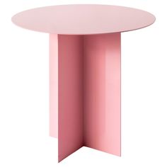 a pink round table with an open section on the top and bottom, against a white background