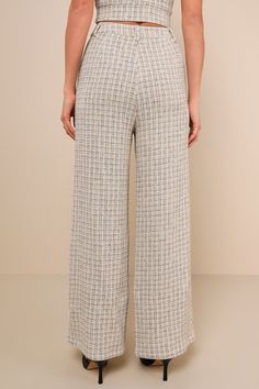 You'll always make an exceptional impression when you wear the Lulus Posh Perception Ivory and Black Plaid Tweed Wide-Leg Pants! Textured woven tweed (with a subtle plaid effect throughout) shapes these trendsetting pants that have a high, banded waist, belt loops, and a hidden zip fly with top button closure. Wide legs boast front diagonal pockets and end at ankle-length hems. Pair with the matching top for a complete look! Fit: This garment fits true to size. Length: Floor length. Size medium Tweed Pants, Work Chic, Lulu Fashion, Black Tweed, Wide Legs, Matching Top, Black Plaid, Clothing For Women, Waist Belt