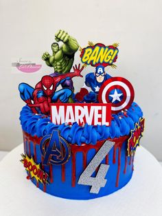 a birthday cake decorated with the avengers theme