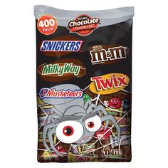 a bag of halloween candy with an evil spider on it's face and eyes