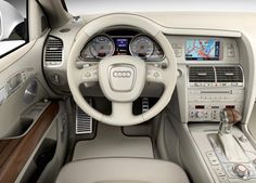 the interior of an audi car with dashboard controls