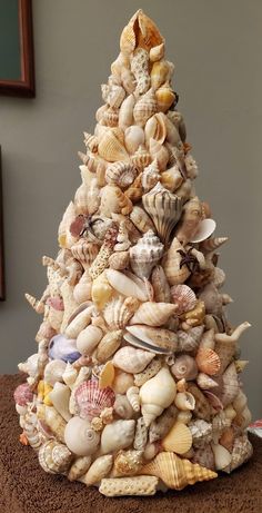 a christmas tree made out of seashells