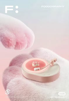 an advertisement for food photography with a pink object in the shape of a teddy bear