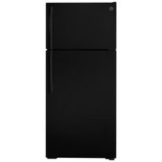 a black refrigerator freezer sitting on top of a white wall