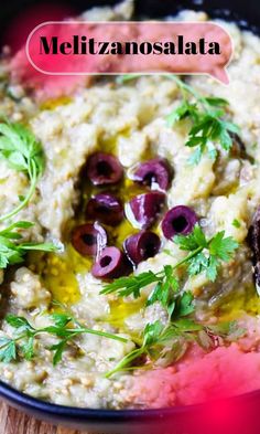 an oatmeal with olives and parsley in a bowl