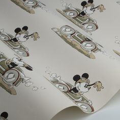 the mickey mouse wallpaper is on display