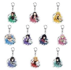 an assortment of anime keychais with different avatars on them, all in various colors