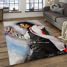 a living room area rug with a painting of a woman in black and white on the floor