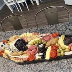 a tray filled with food on top of a counter