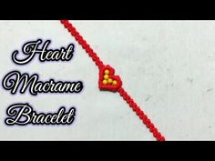 a red and yellow beaded heart on a white background with the words heart macrame bracelet