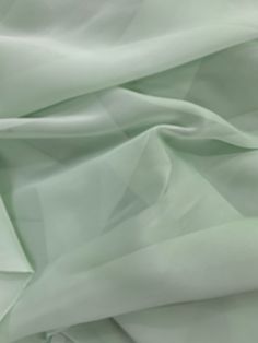 Jolene LIGHT MINT GREEN Polyester Two-Tone Chiffon Fabric by the Yard - 10135 Content: 100% polyester Stretch: None Width: 58 to 60 inches Edge: Straight Uses: Wedding dresses, formal gowns, tops, skirts, lining, party decorations, displays, chair wraps, costumes, rushing, pleating, crushing, shearing, crafts, etc. Light Green Dress Formal, Green Dress Formal, Light Green Fabric, Light Green Dress, Matric Dance, Light Mint Green, Georgette Fabric, Aesthetic Colors, Textiles Fashion