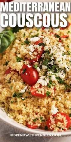 mediterranean couscous with tomatoes and parmesan cheese in a white bowl on a table