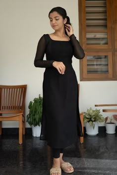 Black Simple Kurti, Black Suits Designs For Women, Long Kurti Pose, New Dress Designs Indian Kurti, Long Black Kurti, Simple Black Kurti Designs, Black Churidar Designs, Georgette Churidar Design, New Pattern Kurti Design