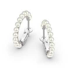 Take your look to the next level with these gleaming pearl hoop earrings. Fashioned in sterling silver, each opulent earring showcases a row of lustrous 3mm ball-shaped cultured pearls curving around the entire hoop to ensure shimmer from every angle. Polished to a bright shine, these earrings secure with latch backs.Carat Weight: 6.5 ctStone Size: 3 mmStone Type: Jeulia® StoneNumber of Stones: 26 Stone Color: Diamond WhiteStone Shape: RoundWeight: 3.63 gWidth: 2.9 mmHeight: 2.1 mmThickness: 3.7 Pearl White Round Beads Earrings, Classic White Hypoallergenic Hoop Earrings, White Hypoallergenic Classic Hoop Earrings, Pearl White Round Beaded Earrings, Elegant Sterling Silver Hoop Earrings With Round Beads, Classic Pearl Huggie Earrings Small Hoop, Classic Pearl Small Hoop Huggie Earrings, Classic Round Pearl Huggie Earrings, Classic Pearl Hoop Huggie Earrings