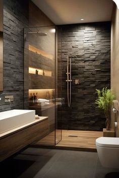 a modern bathroom with stone walls and flooring