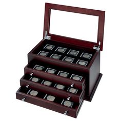 an open wooden box with twelve coin sets in the bottom section and one on top